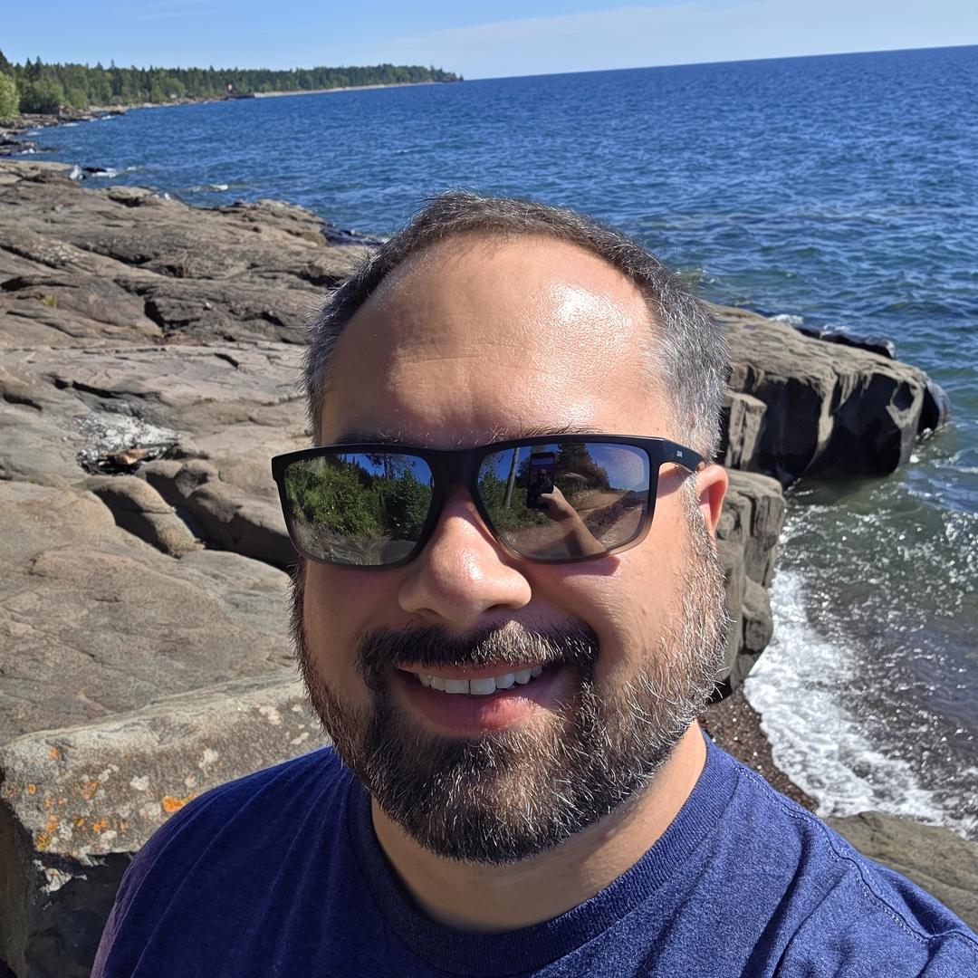 Allen on the rocky Lake Superior shoreline along Minnesota's North Shore